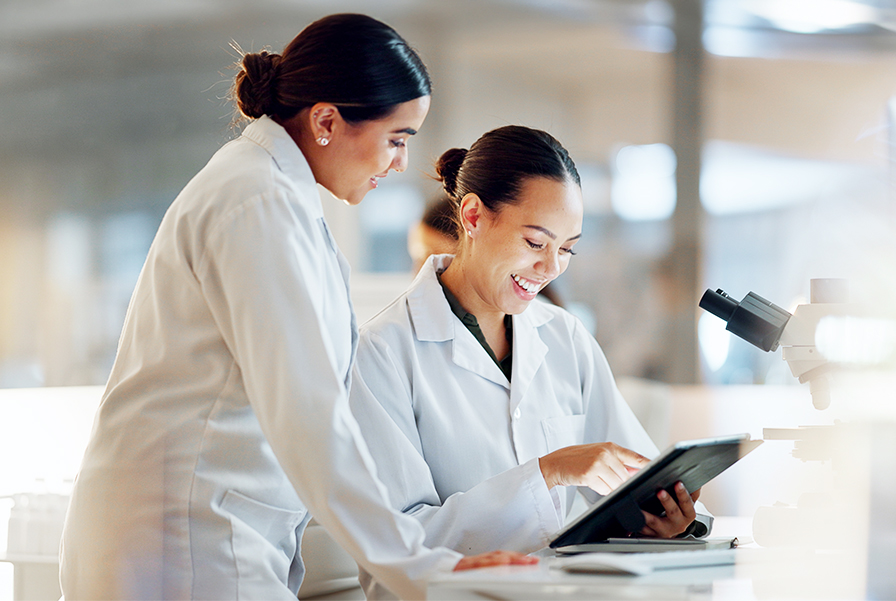 Two UOW Malaysia students in the Foundation in Science program collaborate in a modern lab at the Batu Kawan campus.